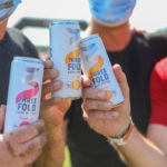 Participants toast with their energy drink
