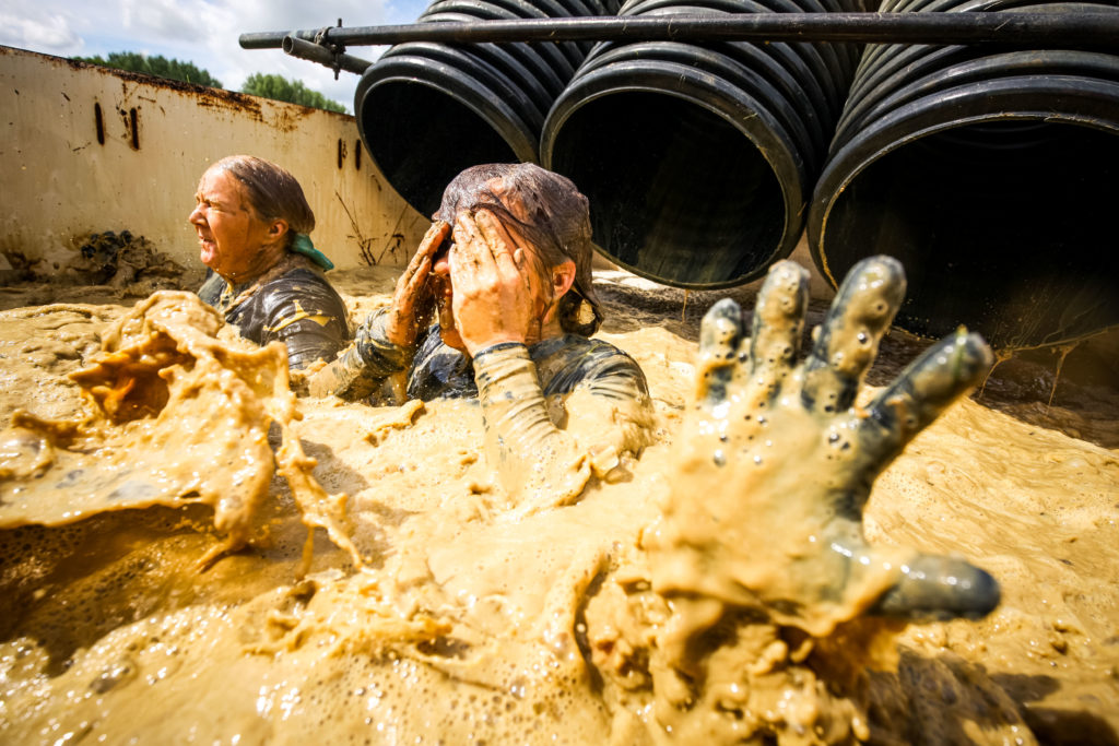 Participants fell into the mud from the tube