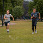 Two people running in the park