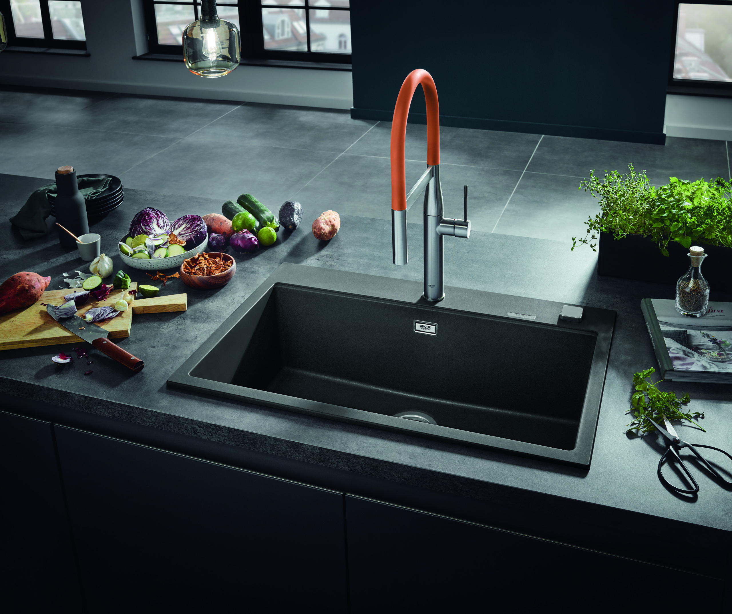 Kitchen sink with vegetables on the side