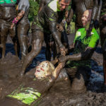 team in mud at north west event