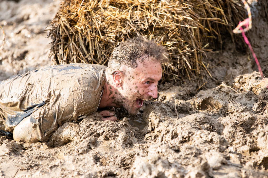 man stuck in mud