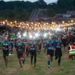 Participants running with their flashllights on