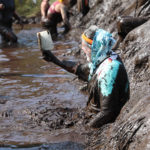 grandma in mud obstacle