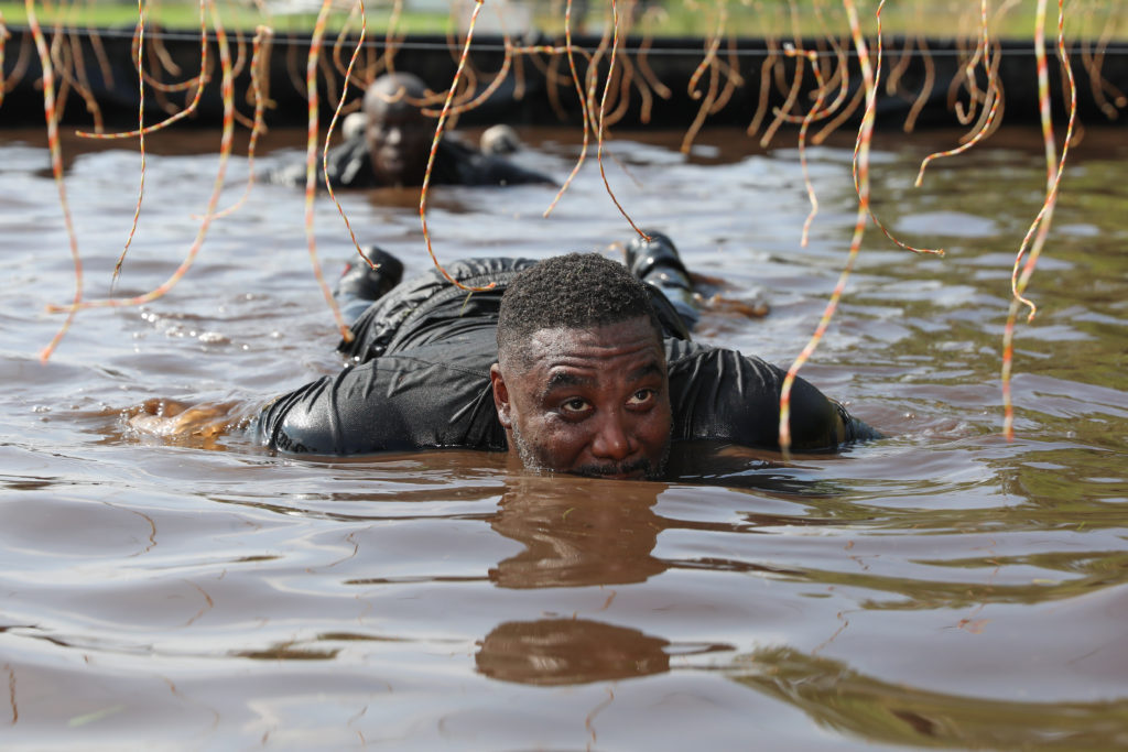 man in water obstacle
