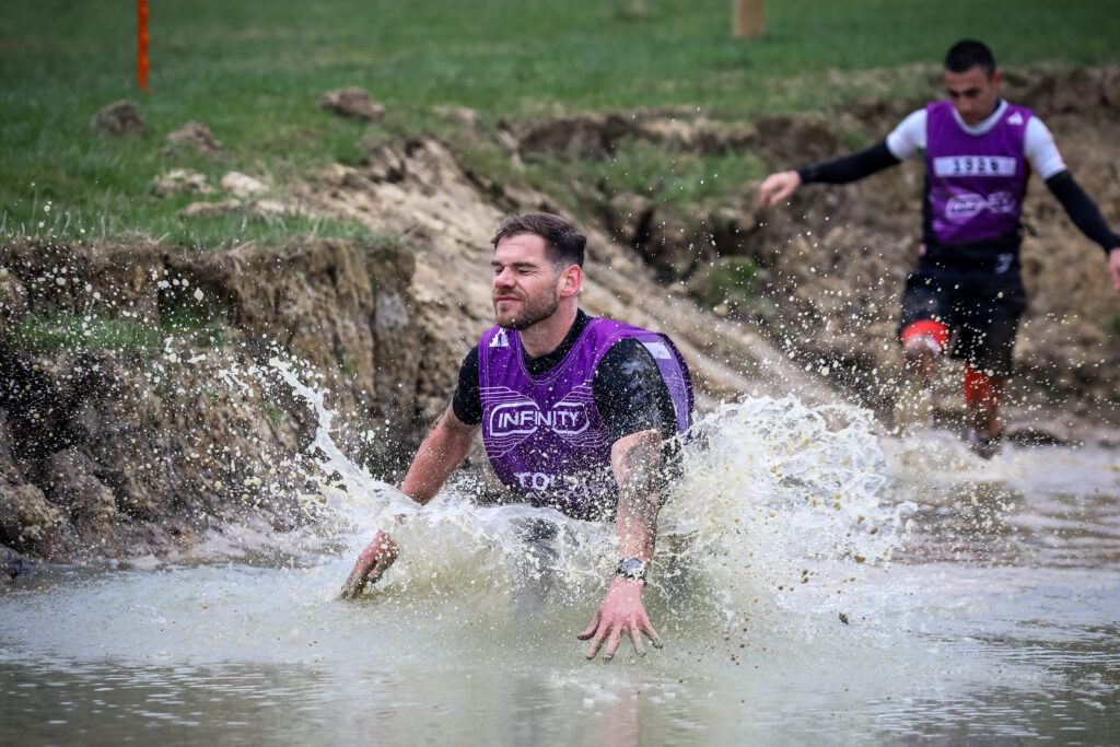 man in water obstacle at Midlands event