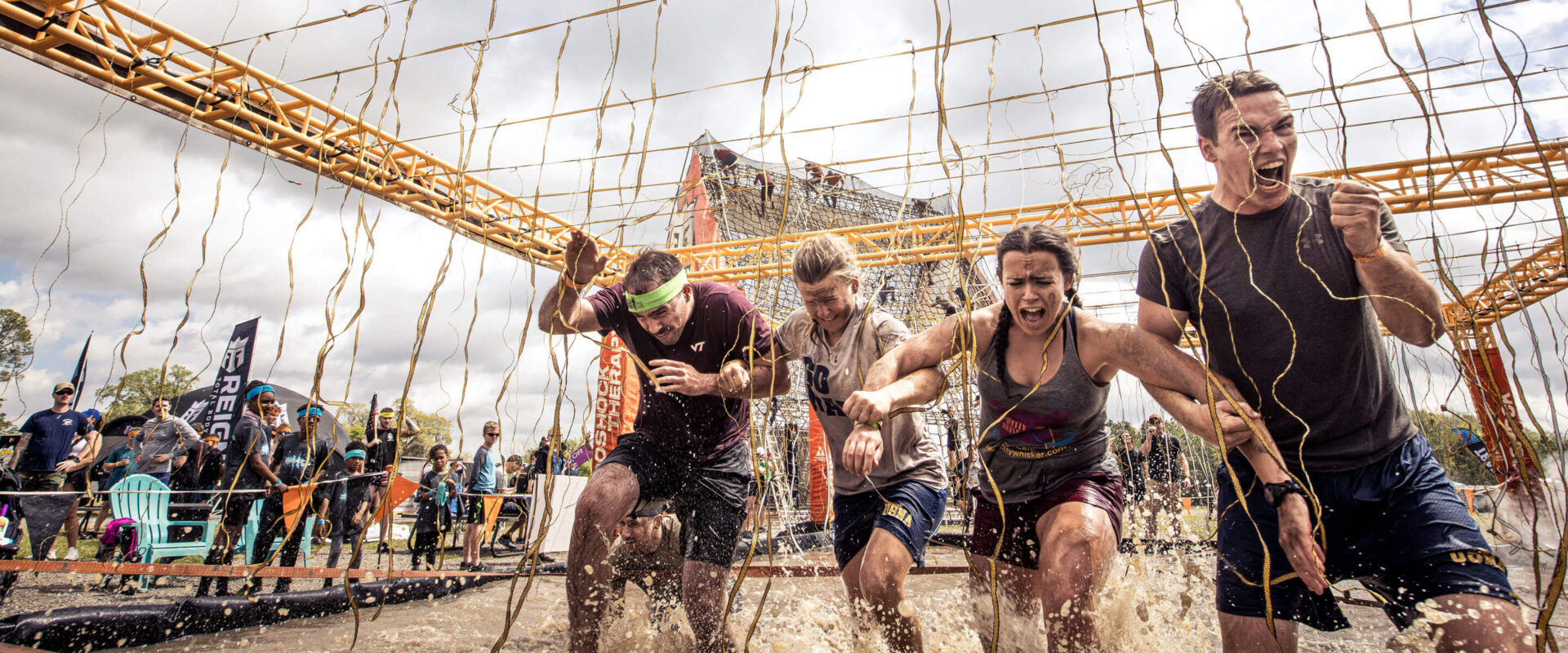 Mudders linking each other arms while screaming in fear of Electroshock Therapy