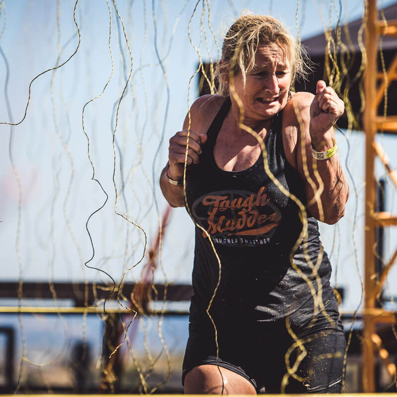 woman scared to touch the electric wires of Electroshock Therapy